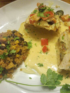A picture of Quinoa Stuffed Chicken Breast with Cream Sauce.