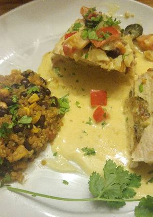 A picture of Quinoa Stuffed Chicken Breast with Cream Sauce.