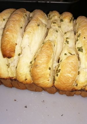 Una foto de Pan de ajo y cebollita #caminodesabores