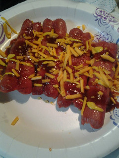 A picture of cheesy splitdogs.