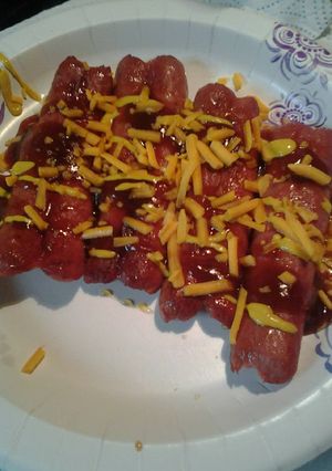 A picture of cheesy splitdogs.