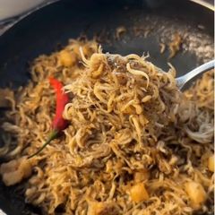 A picture of Braised Black Pepper Baby Anchovies | Cá Cơm sữa Kho Tiêu.