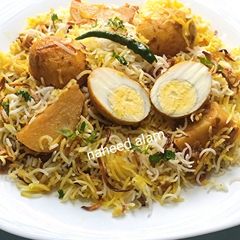 A picture of Achari Egg Biryani.