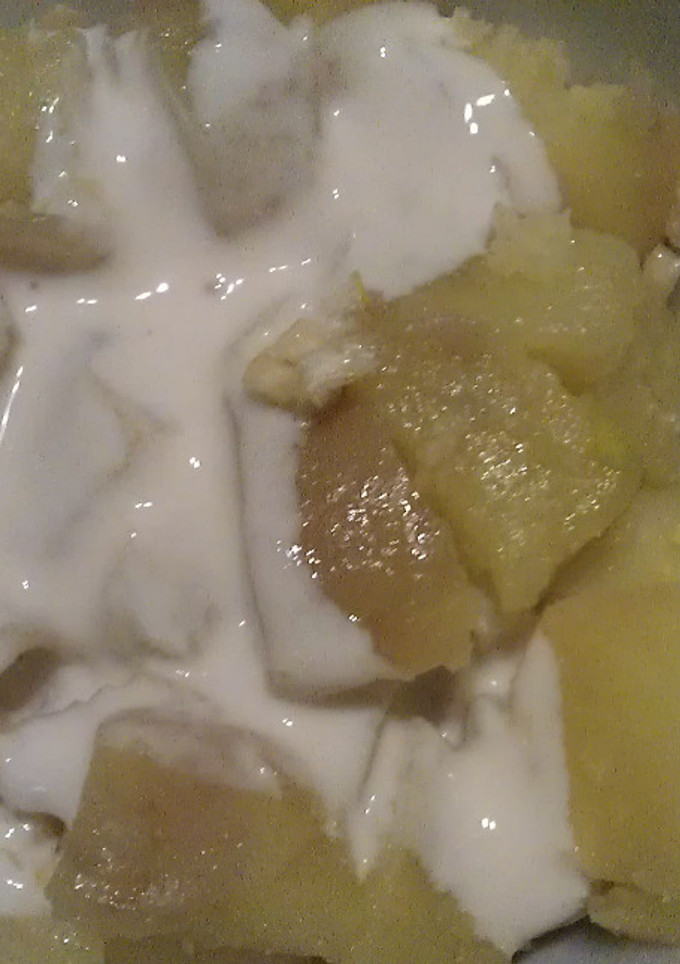 Una foto de Patatas cocidas en la salsa de ajo