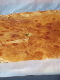 Una foto de Empanada de hojaldre con jamón y queso