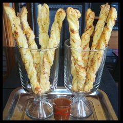 A picture of Cheese And Chives breadsticks.