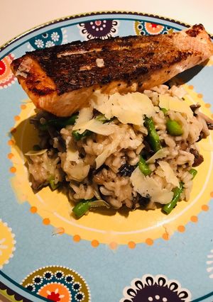 A picture of Mushroom and Asparagus Risotto with Grilled Salmon.
