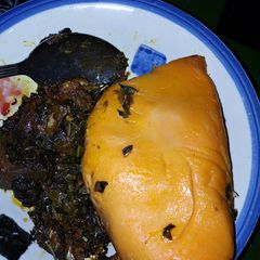 A picture of Moi moi and vegetable soup.