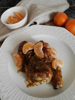 Una foto de Muslitos de pollo con salsa de mandarina