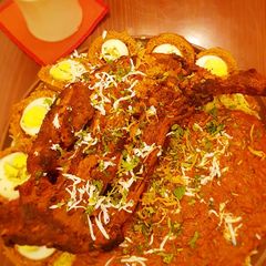 A picture of Raan Biryani with scotched eggs.