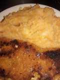 Milanesas de filet de pescado, y puré de papas y calabaza