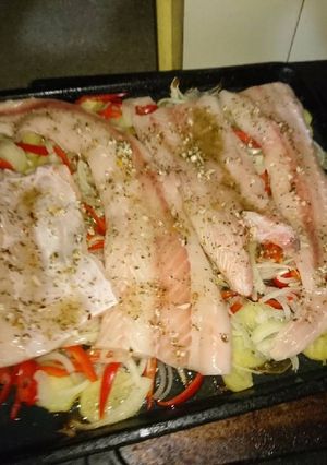Una foto de Merluza al horno con papas