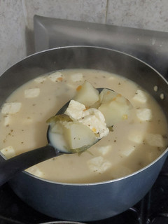 Una foto de Caldo de queso