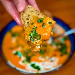 A picture of Creamy Pumpkin Soup with Chimichurri and Sourdough Croutons: The Ultimate Comfort Dish by TastyPinch.