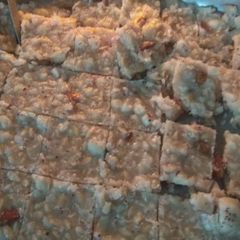 A picture of Shahi Coconut Panjiri/Burfi/Tukdi with Nuts.