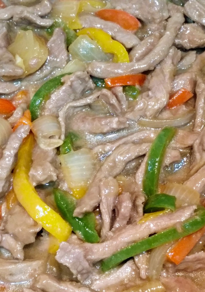Una foto de Ternera tres pimientos con arroz🍛