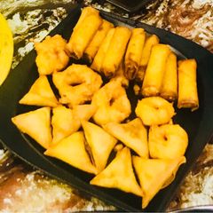 A picture of Spring roll and Samosa Platter.