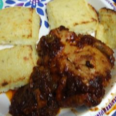 A picture of Simmered Thighs in Tomato.