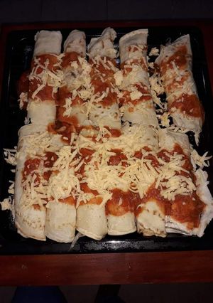 Una foto de Canelones de jamón y queso