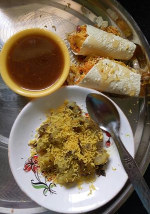 A picture of Chatpata sweet potato with khata mitha papad roll.