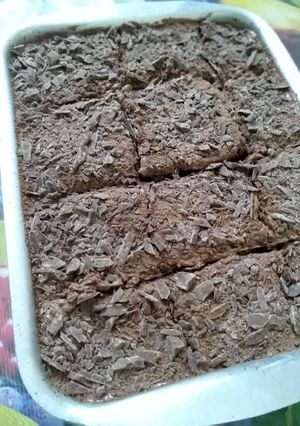 صورة لوصفة كيكة الشوكولاته مع بودنج الشوكولاته والكريمه 😋💓