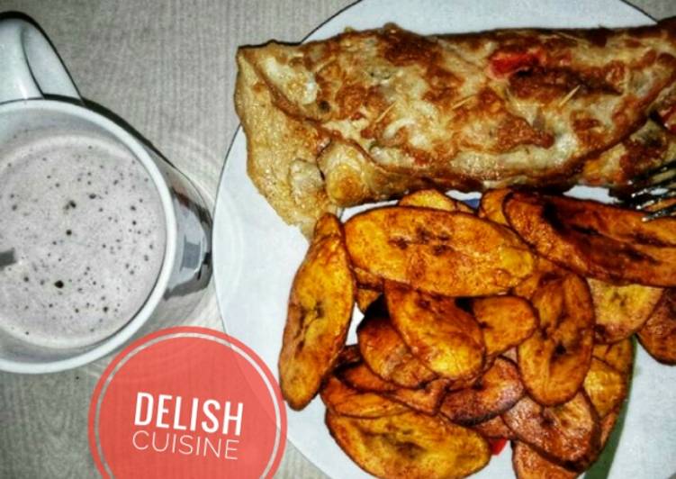 Easiest Way to Prepare Favorite Fried plantain and eggs with a cup of hot tea