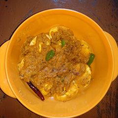 A picture of Dim Posto (Egg in Poppy seed gravy).
