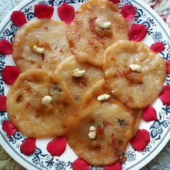A picture of Mishti aloo malpua / sweet potato malpua.