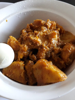 A picture of Yam and ripe plantain porriage with boiled egg.