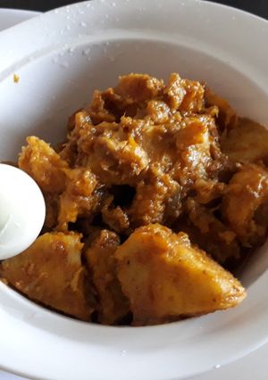 A picture of Yam and ripe plantain porriage with boiled egg.