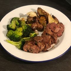 A picture of Curried lamb neck, roast Jerusalem artichokes and garlic broccoli.
