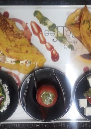 A picture of Stuffed besan rice chilla.