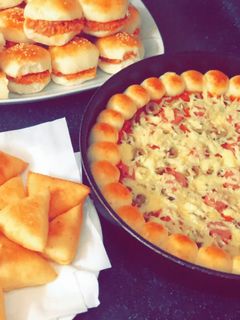 صورة لوصفة عجينه تنفع لجميع انواع المعجنات والسمبوسه
