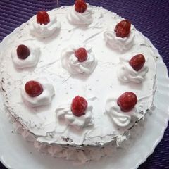 Chocolate cake with whipped cream A picture of Chocolate cake with whipped cream.