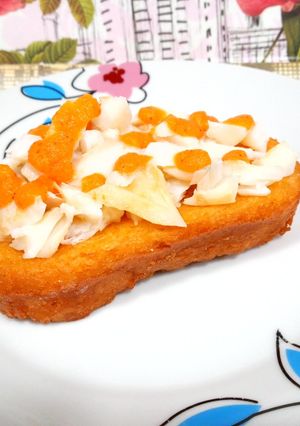 Una foto de Bacalao confitado sobre torrija de tomate