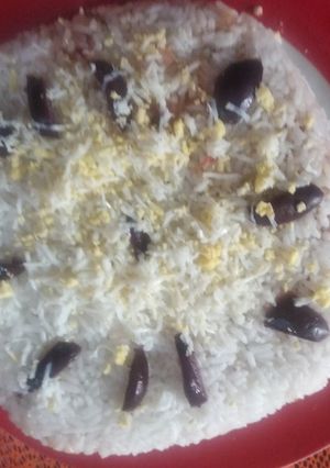 Una foto de Arroz tapado para que quedes encantado