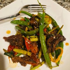 A picture of Beef Sesame Teriyaki stir fry (Trader Joe’s products).