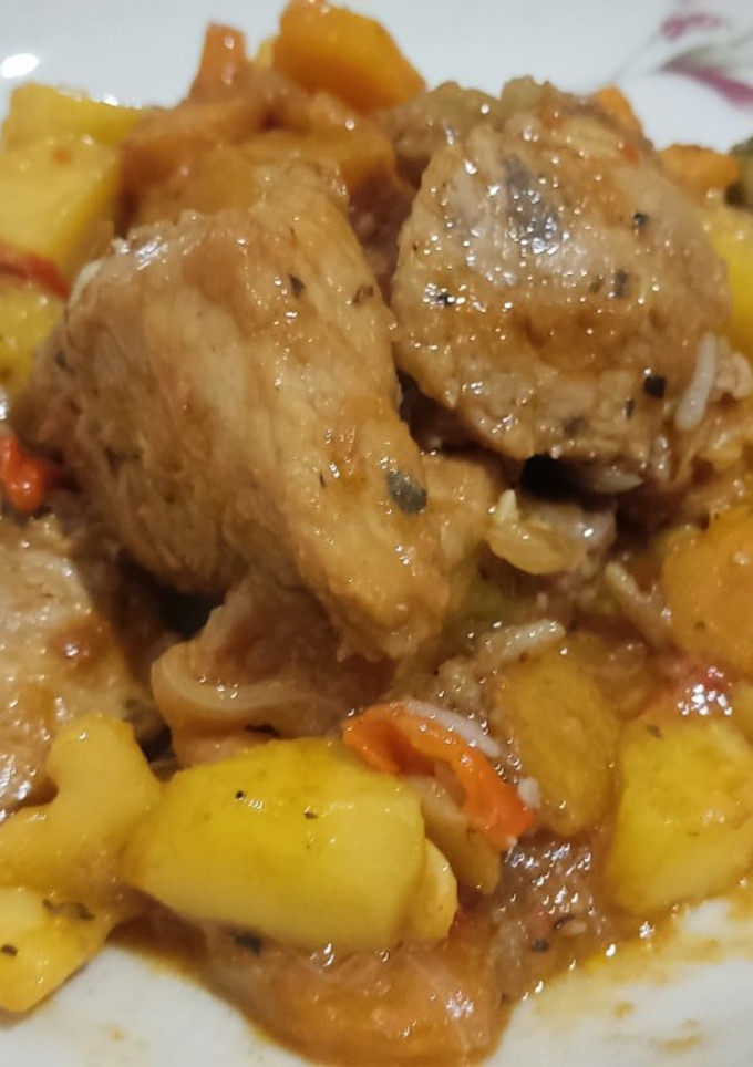 Una foto de Filete de cerdo con papa y zanahoria