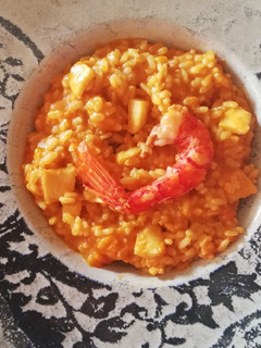 Una foto de Arroz con carabineros y calamares