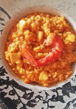 Una foto de Arroz con carabineros y calamares