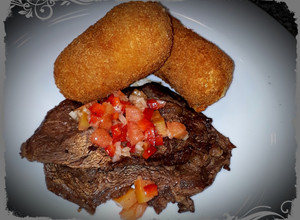 Una foto de Churrasco Americano y Croquetas de Papas