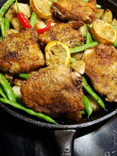 A picture of Lemon Dijon Chicken, potatoes and green beans.