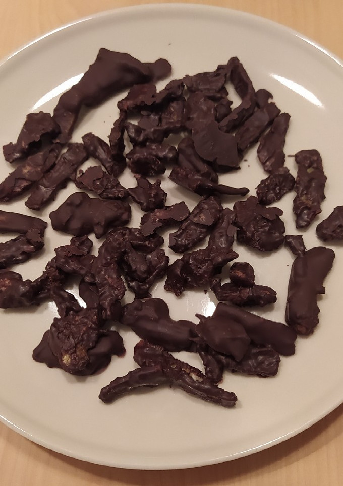Una foto de Naranja escarchada bañada con chocolate