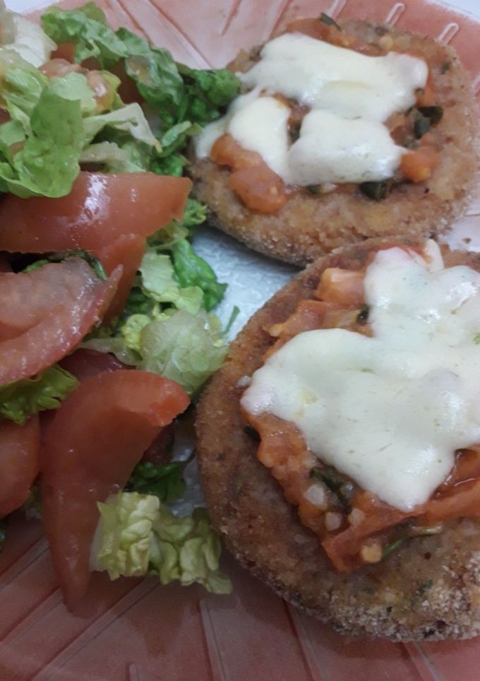 Una foto de Milanesas de calabaza rellenas