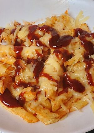 A picture of My Chips Melted Cheese and BBQ Sauce. 🤗#Lunch#Sidedish.