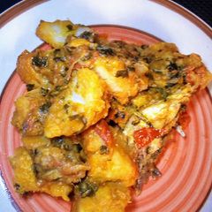 A picture of Yam porridge with smocked fish.