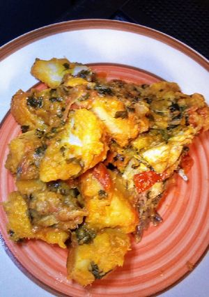 A picture of Yam porridge with smocked fish.