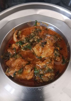 A picture of Methi chicken curry.
