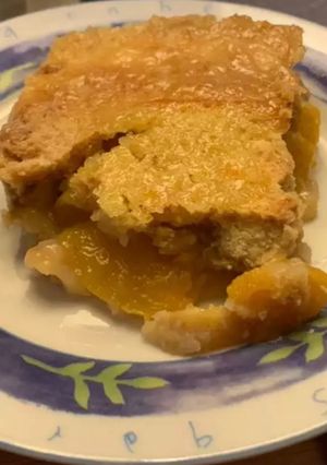 Una foto de Cobbler peach (postre de durazno)