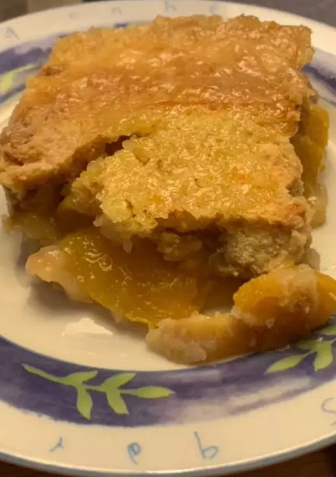 Una foto de Cobbler peach (postre de durazno)